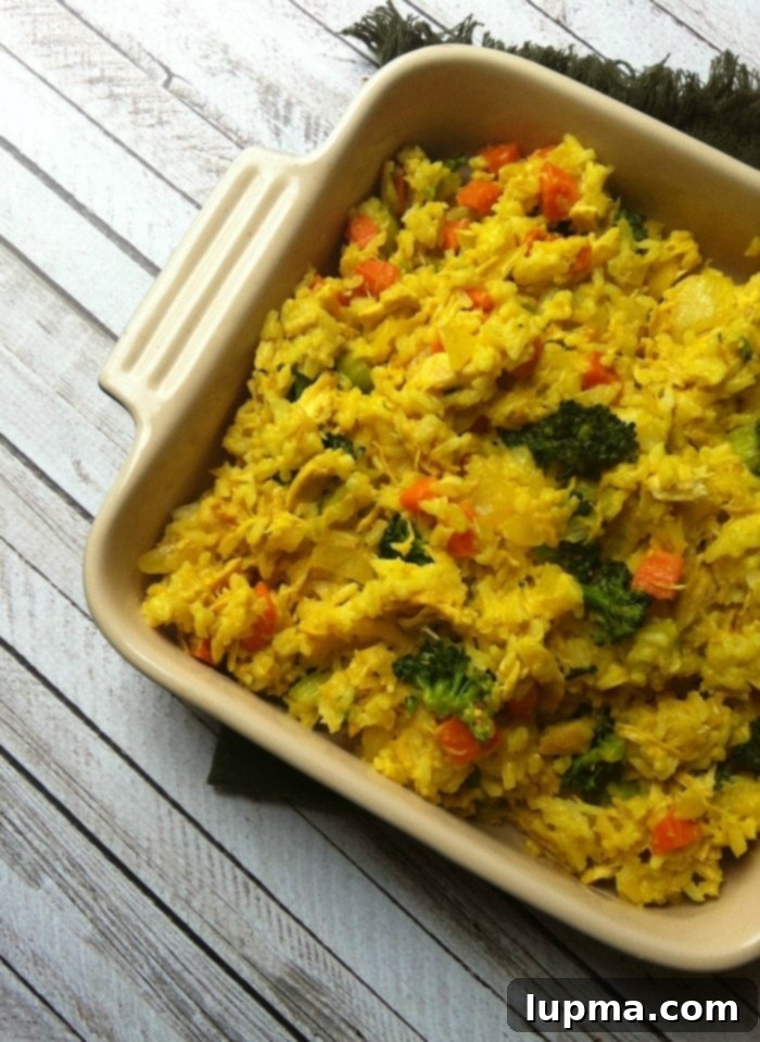 Fragrant Curried Chicken and Rice Bake 2 Comforting Curried Chicken and Rice Casserole dish, ready to serve