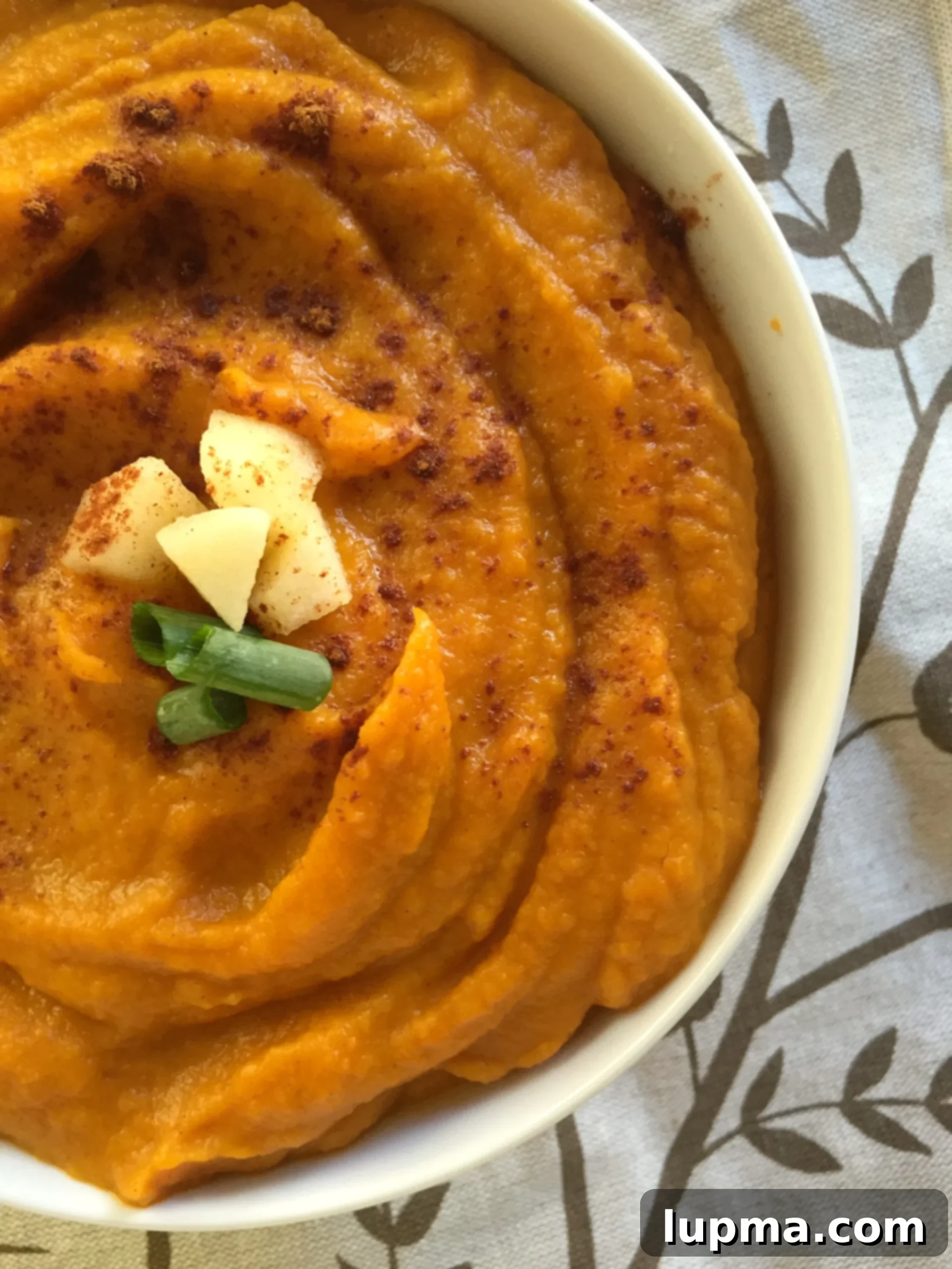 Comforting Butternut Squash Sweet Potato Apple Soup 2 Butternut Squash Sweet Potato Apple Soup - A creamy fall soup with sweet and rich flavors.