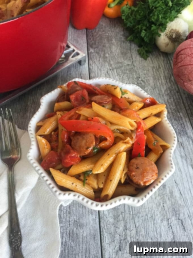 Spicy Cajun One-Pot Wonder 3 Close-up of One Pot Cajun Pasta in a skillet, showcasing the ingredients.