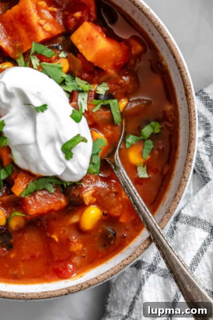 Hearty Sweet Potato Chili 2 Sweet Potato Chili in a bowl with a spoon