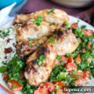 Herbed Mediterranean Chicken with Basmati Rice 6 A top-down view of the prepared Mediterranean Chicken with Basmati Rice, garnished with fresh herbs.