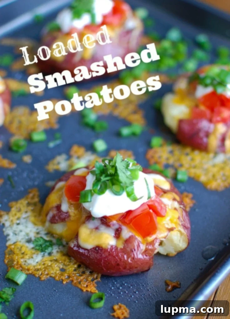 Ultimate Loaded Smashed Potatoes 2 Loaded Smashed Potatoes are crispy on the outside and soft on the inside and loaded with cheese, sour cream, tomatoes, green onion and cilantro. These make an easy family meal or appetizer for game day or a party!