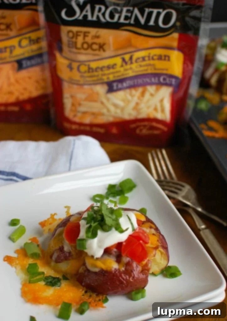 Ultimate Loaded Smashed Potatoes 5 Loaded Smashed Potatoes are crispy on the outside and soft on the inside and loaded with cheese, sour cream, tomatoes, green onion and cilantro. These make an easy family meal or appetizer for game day or a party!