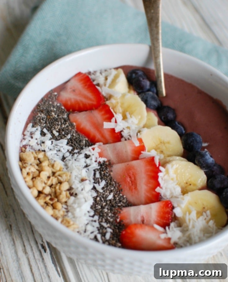 Vibrant Chia Seed Fruit Medley 3 Chia Seeds Fruit Bowl with a spoon, ready for tasting.