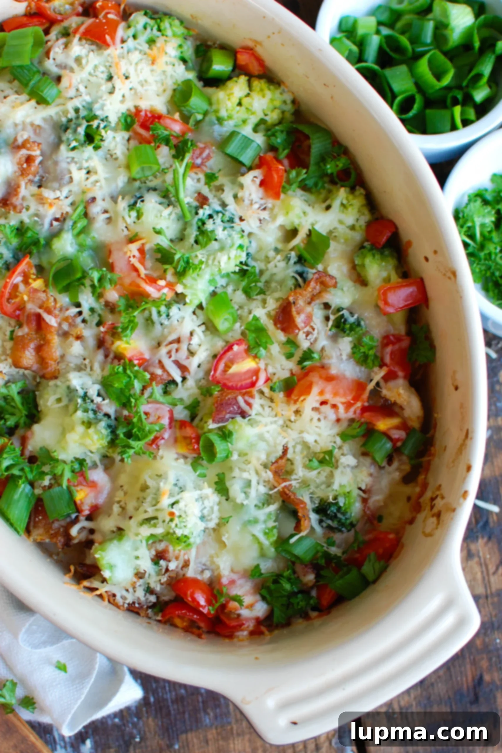 Cheesy Broccoli Chicken Bake 2 A delicious and comforting Baked Broccoli Cheese Chicken dish, perfect for a family weeknight meal. Featuring tender chicken breasts, fresh broccoli, crispy bacon, melted Sargento cheese, and a crunchy panko topping.