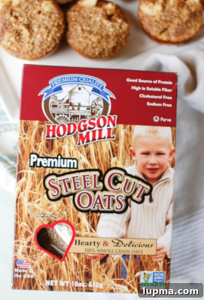 Spiced Apple & Steel Cut Oat Breakfast Cups 4 Overhead shot of Baked Apple Cinnamon Steel Cut Oat Cups in muffin liners, highlighting their convenience and appeal for healthy meal prep.