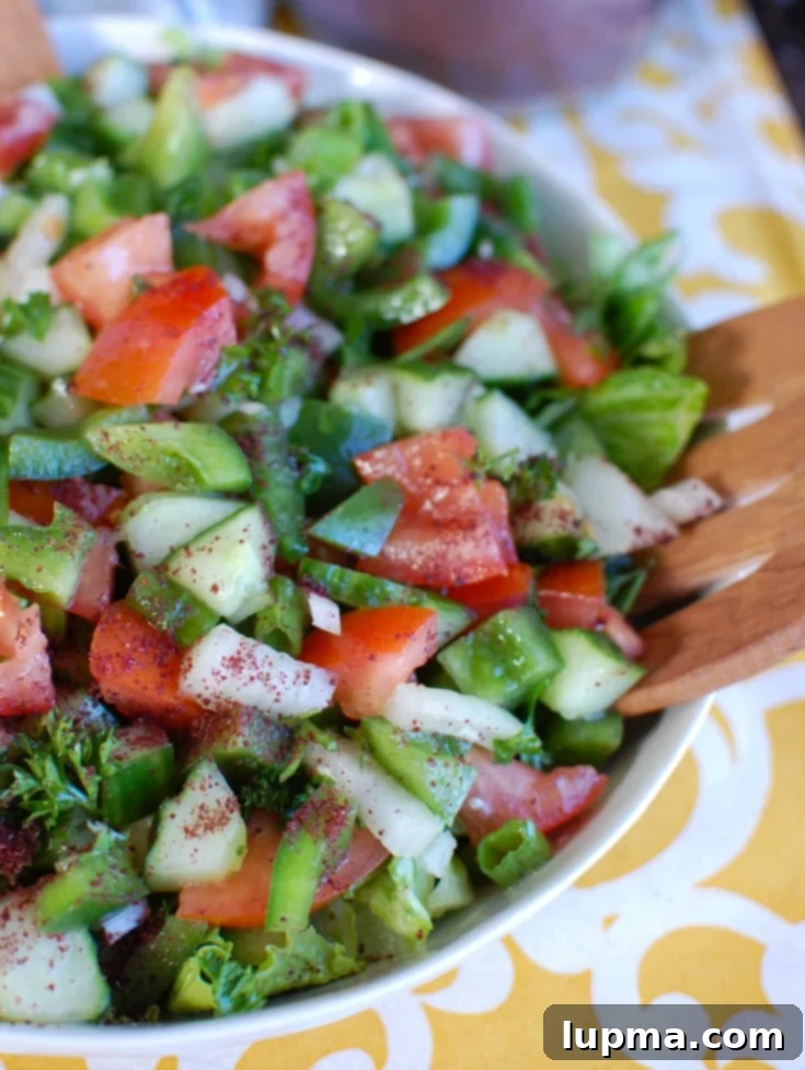 Fresh & Easy Lebanese Salad 3 Easy Lebanese Salad in a large white serving bowl, ready to be enjoyed.