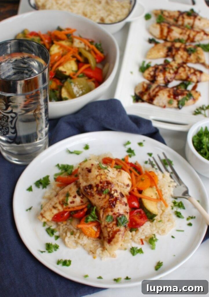 One-Pan Balsamic Chicken and Roasted Vegetables 4 Sheet Pan Honey Balsamic Chicken Tenders and Vegetables Plated Dinner
