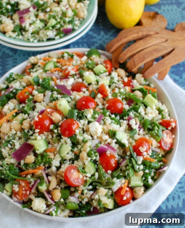 Mediterranean Roasted Cauliflower & Chickpea Salad 5 Mediterranean Chickpea Cauliflower Salad with vibrant tomatoes and fresh herbs.