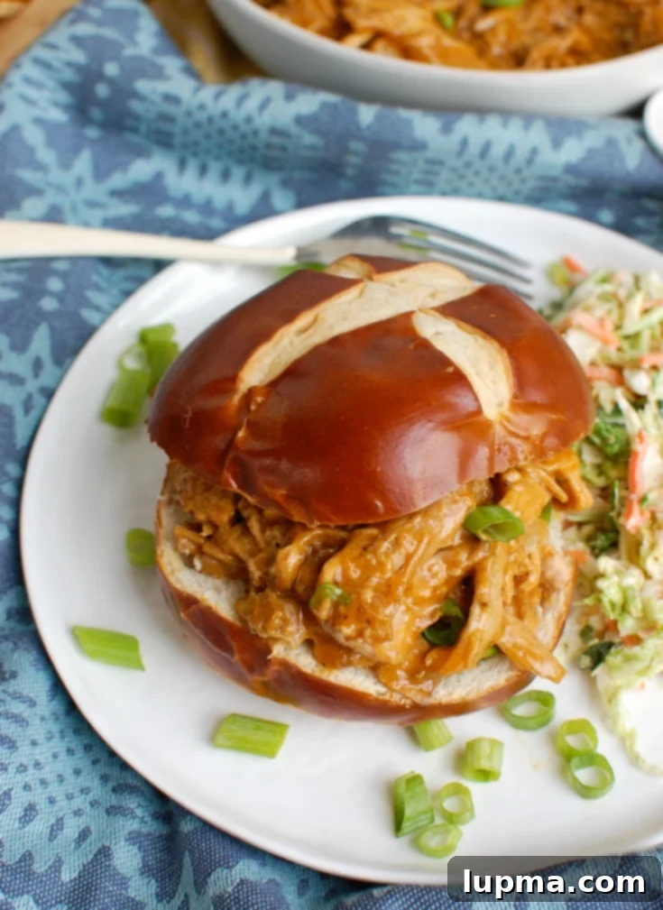 Melt-in-Your-Mouth Slow Cooker Pork Tenderloin 4 How to Make Pork Tenderloin in the Slow Cooker on plate.