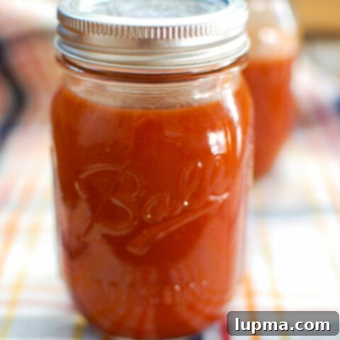 From Ohio Fields to BBQ Flavor: My Sauce Story 10 A mason jar filled with delicious Homemade Barbecue Sauce, ready for use.