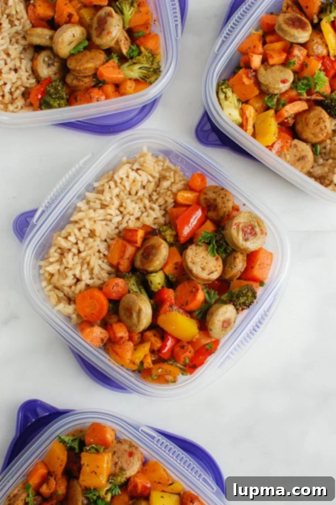 Golden Roasted Chicken Sausage and Garden Veggies 6 Meal prep containers with Sheet Pan Chicken Sausage and Vegetables portioned for future meals.