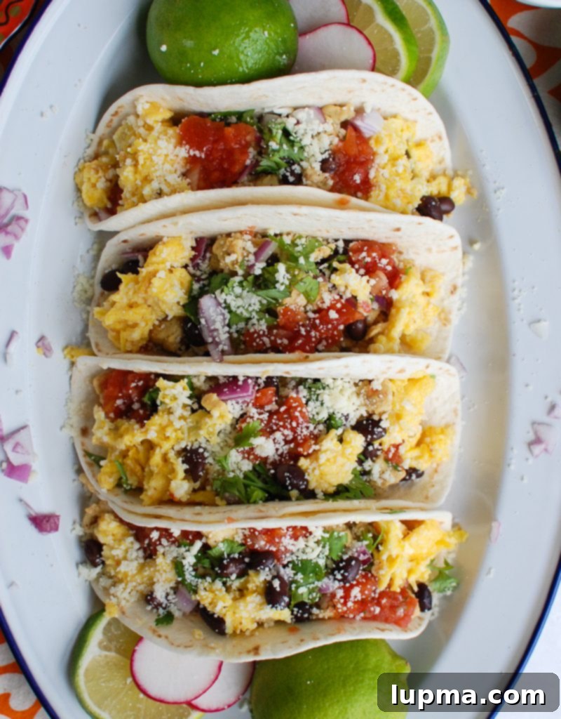 Desert Dawn Egg Tacos 3 Southwest Breakfast Egg Tacos with ingredients like onion and cilantro