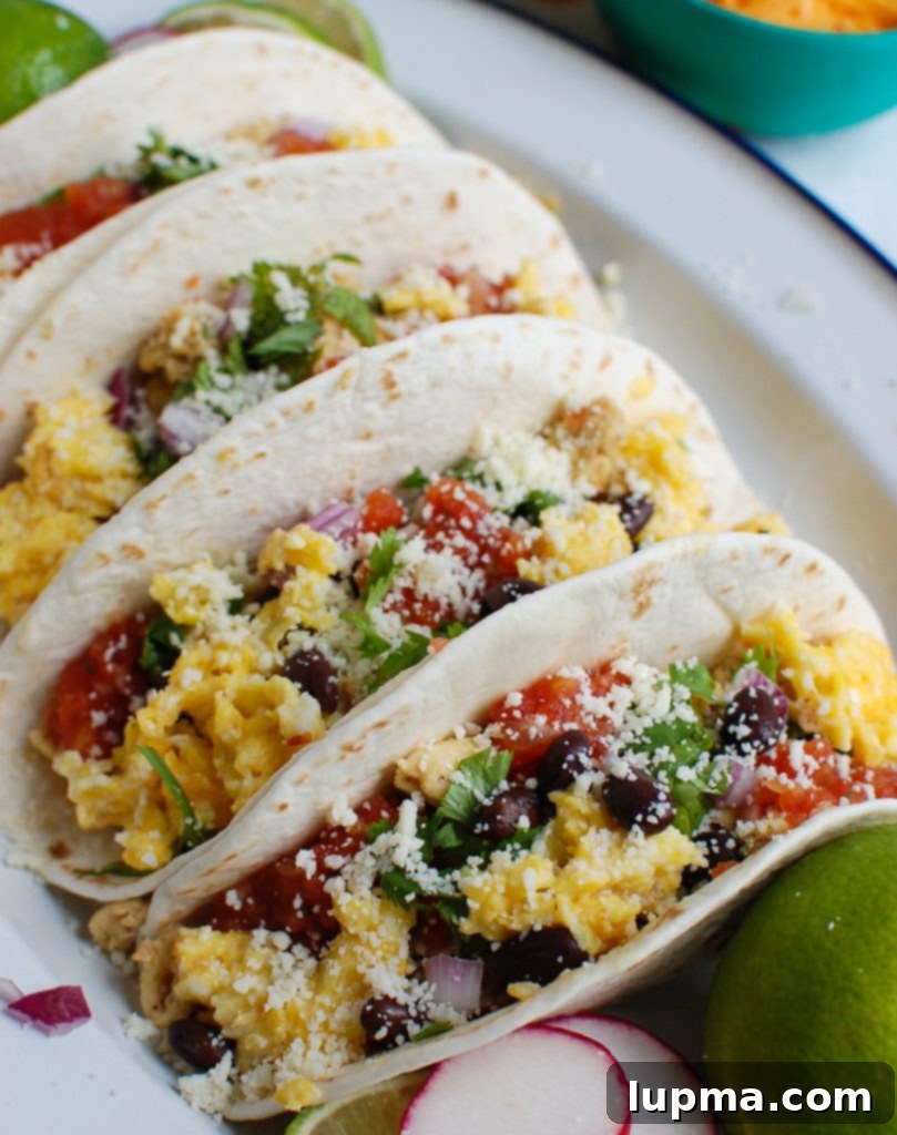 Desert Dawn Egg Tacos 4 Southwest Breakfast Egg Tacos served with a side of fresh salsa