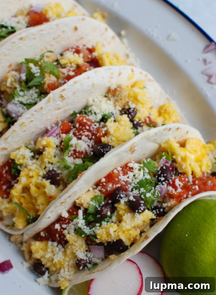 Desert Dawn Egg Tacos 5 Close-up of Southwest Breakfast Egg Tacos garnished with Cotija Cheese