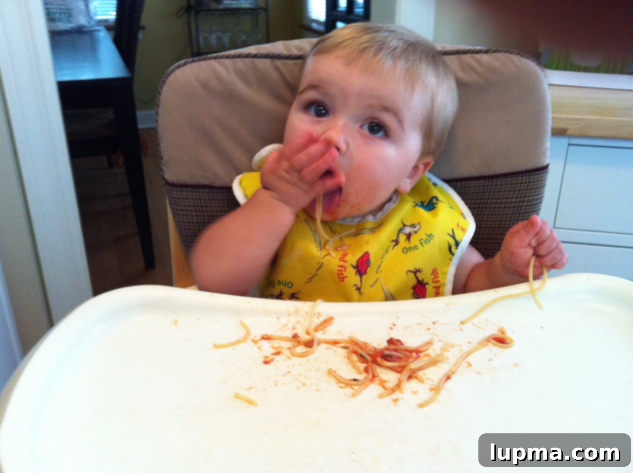 Close up shot of well-cooked spaghetti with a mild tomato sauce