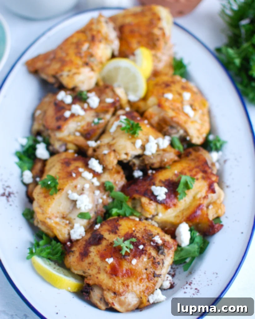 Vibrant Mediterranean Chicken 4 Mediterranean Chicken on a serving platter, ready to be enjoyed.
