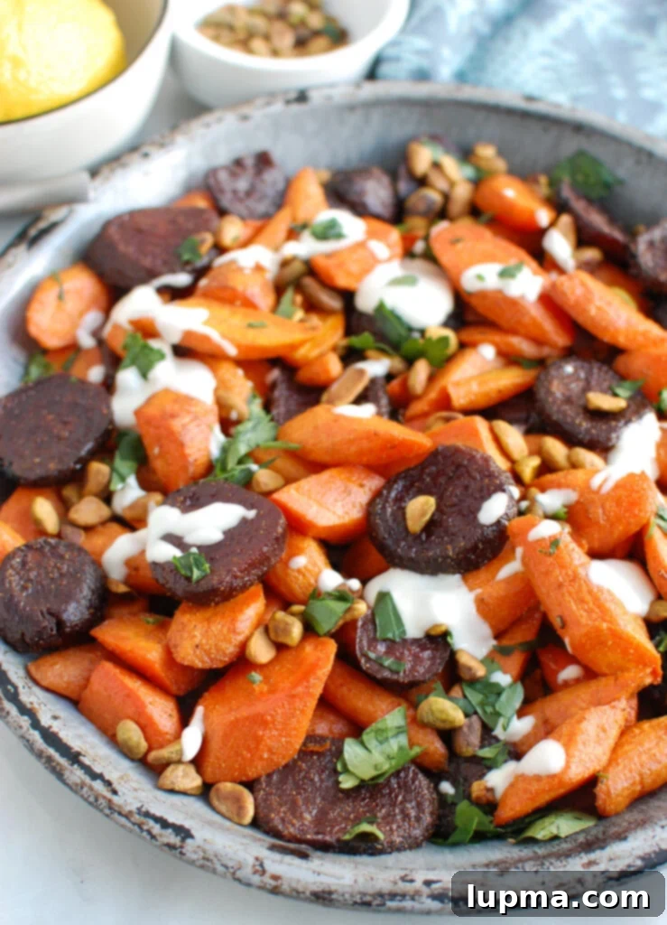 Caramelized Carrots and Beets with Creamy Tahini Drizzle 2 Roasted Carrots and Beets with Tahini on metal plate