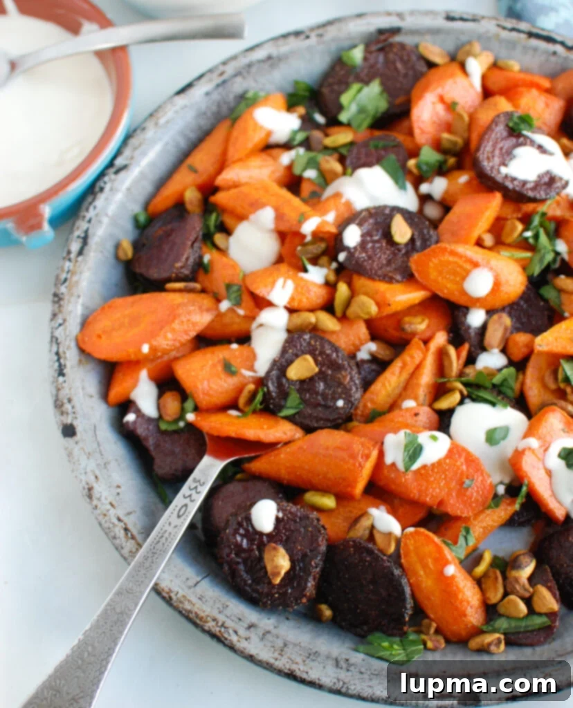 Caramelized Carrots and Beets with Creamy Tahini Drizzle 4 Roasted Carrots and Beets with Tahini on plate