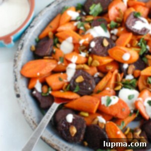 Caramelized Carrots and Beets with Creamy Tahini Drizzle 7 Roasted Carrots and Beets with Tahini on plate