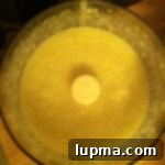 Close-up of the delicious Skinny Baked Potato Soup ready to eat