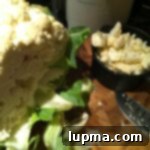 Sautéed leeks in a pan, ready for blending into soup