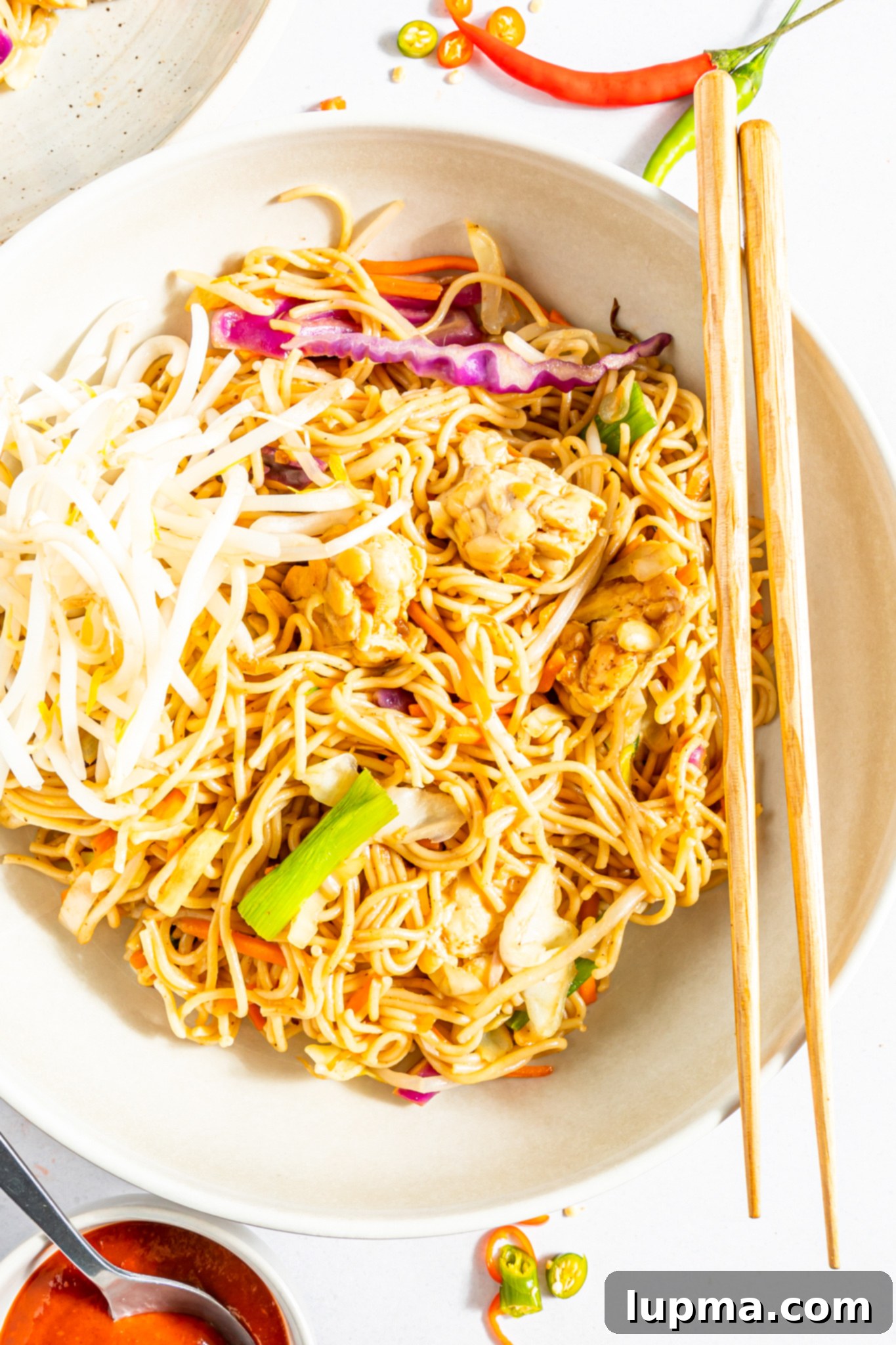 Quick Veggie Noodle Stir-Fry 4 Easy Vegetable Chow Mein with chopsticks.