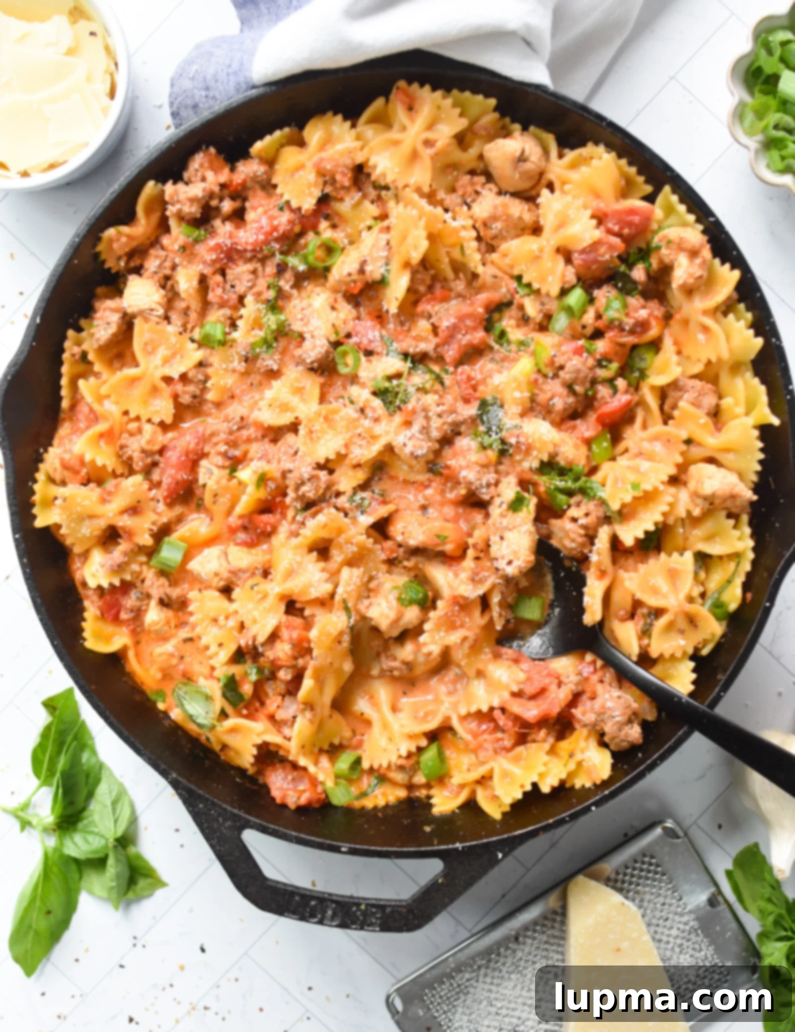 The Ultimate Creamy Chicken & Chorizo Pasta 5 Creamy Chicken and Chorizo Pasta Recipe in a cast iron skillet.