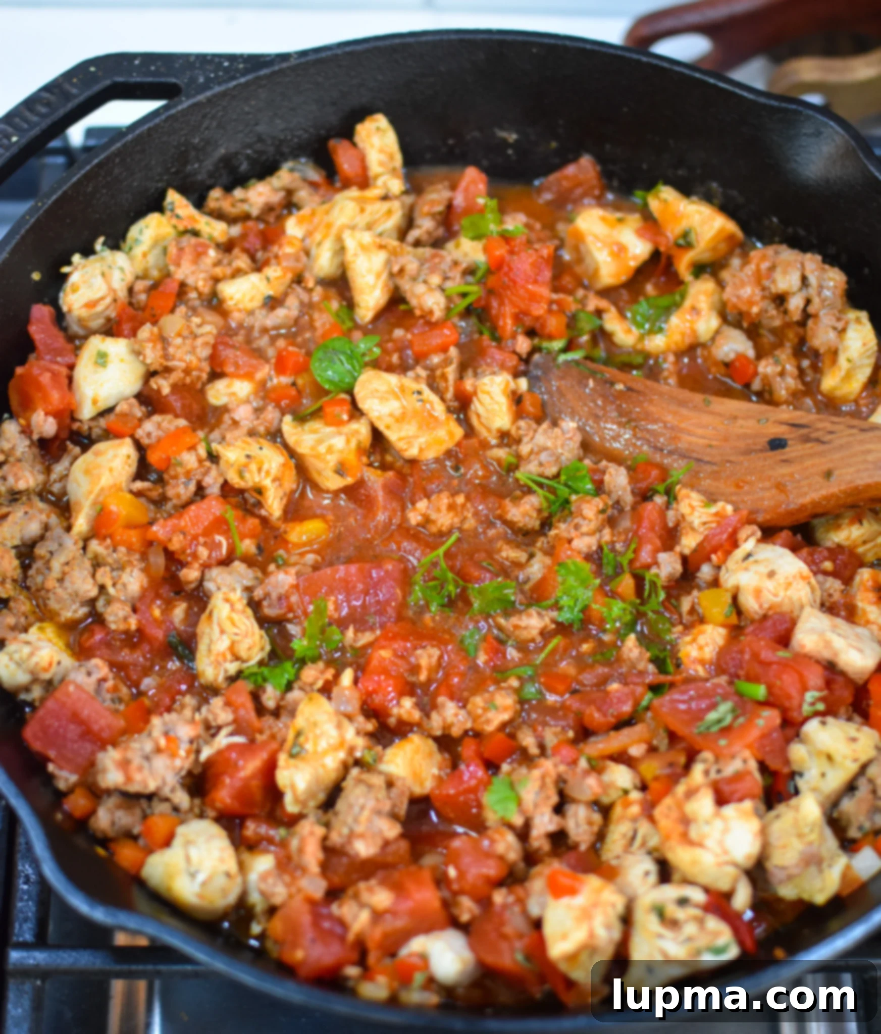 The Ultimate Creamy Chicken & Chorizo Pasta 7 Creamy Chicken and Chorizo Pasta Recipe in a skillet.
