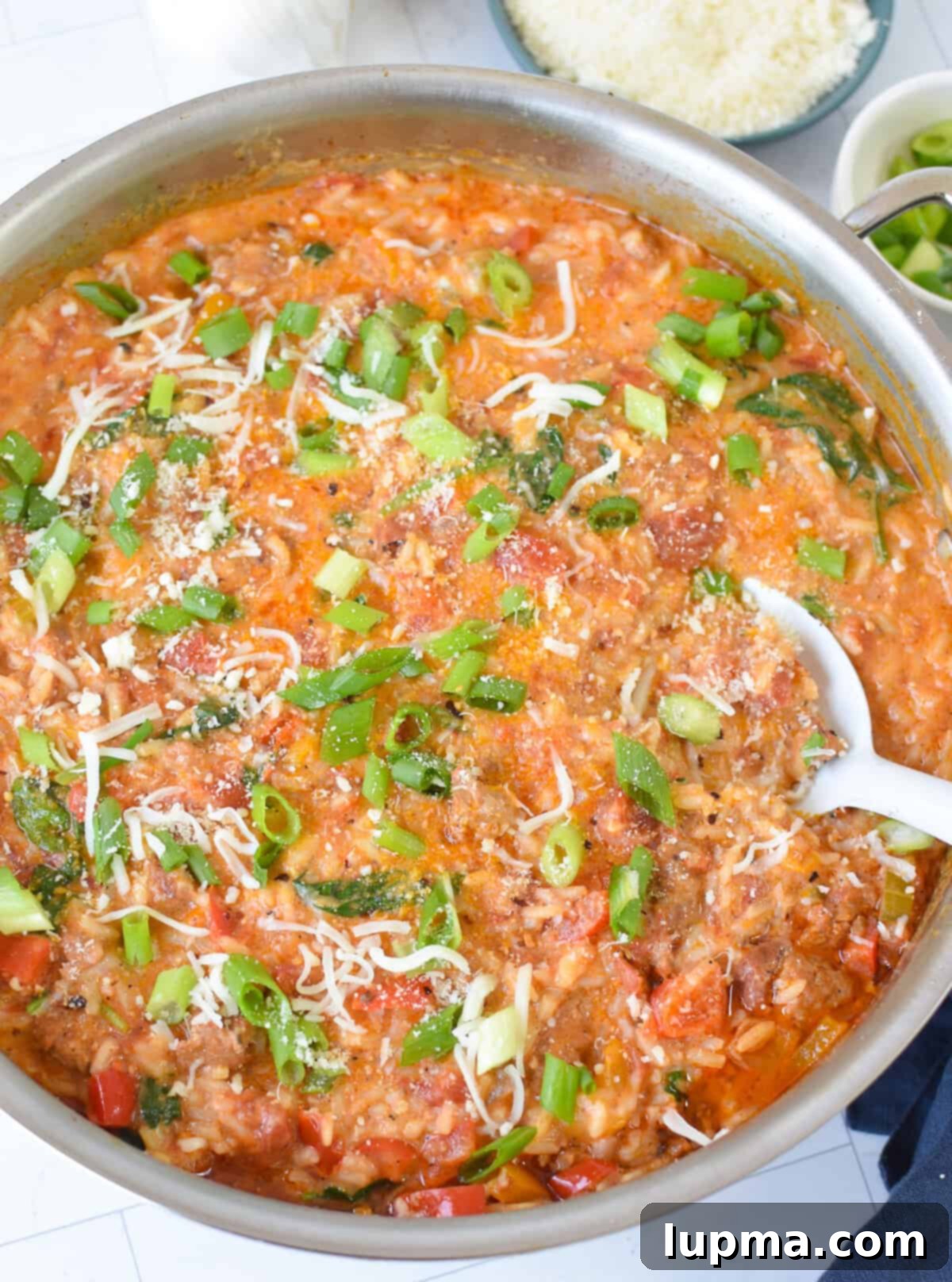 Hearty Creamy Cajun Sausage Rice Skillet 2 Creamy Cajun Sausage Rice Skillet in a skillet