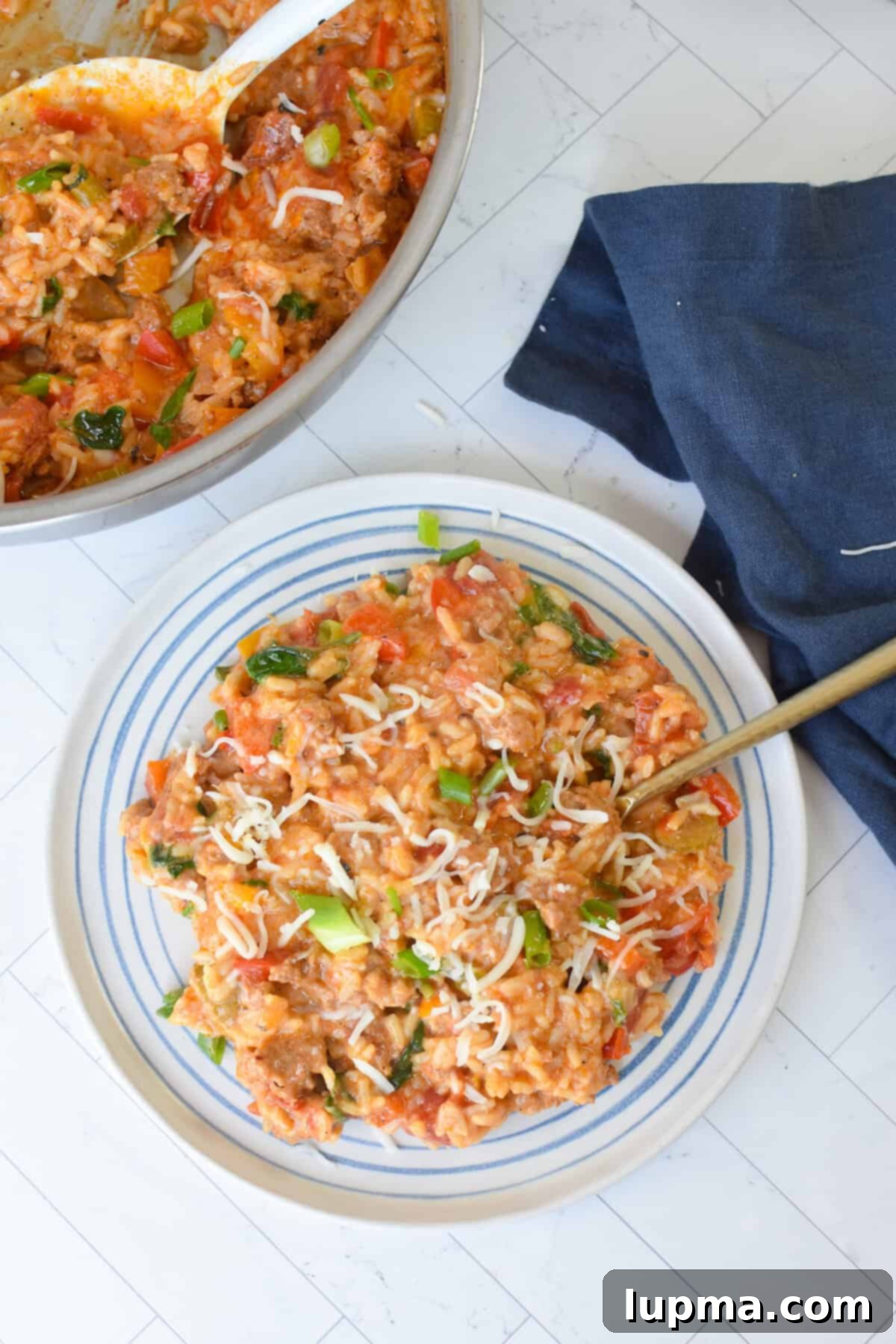 Hearty Creamy Cajun Sausage Rice Skillet 3 Creamy Cajun Sausage Rice Skillet on a plate