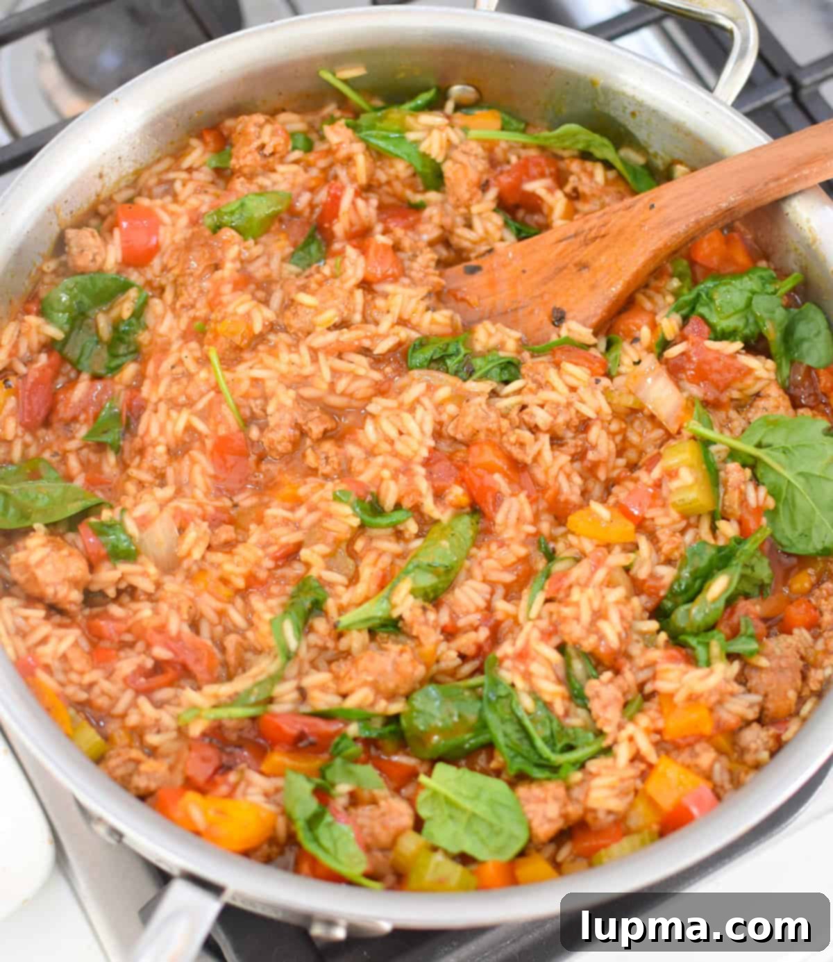 Hearty Creamy Cajun Sausage Rice Skillet 8 Creamy Cajun Sausage Rice Skillet with spinach