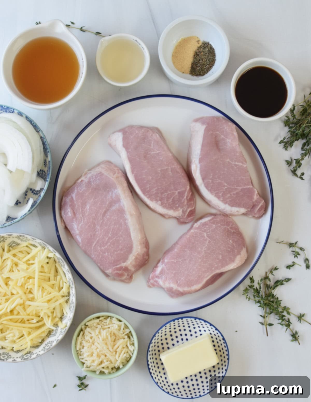 Smothered French Onion Pork Chops 4 Fresh ingredients laid out for French Onion Pork Chops recipe preparation