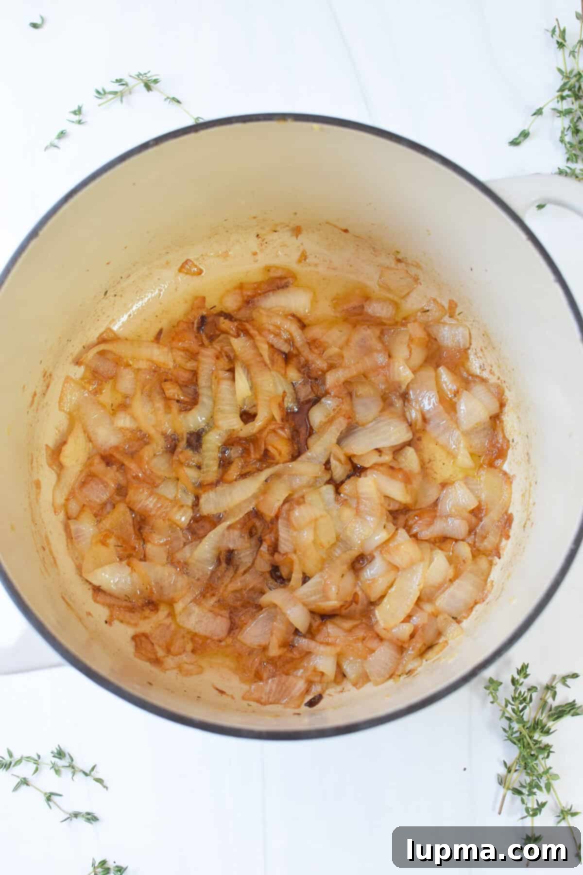 Smothered French Onion Pork Chops 6 Caramelized onions in a Dutch oven, perfect for French Onion Pork Chops