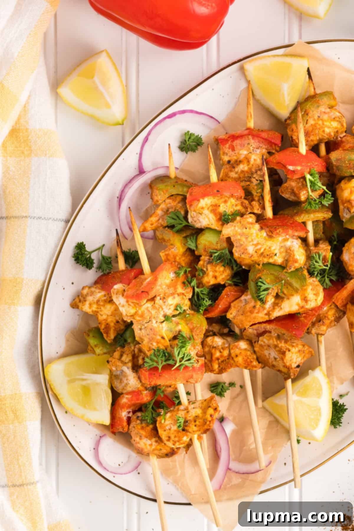 Smoky Chicken Tikka Skewers 5 Chicken Tikka Kebabs on a platter