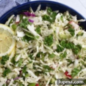 Fresh Lebanese Cabbage Slaw 10 A beautifully presented Malfouf Salad, a refreshing Lebanese cabbage salad, ready to be enjoyed.