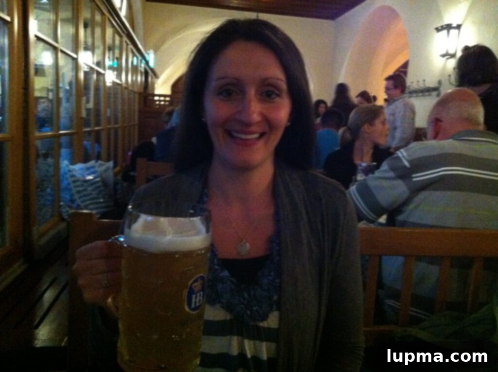 Traveler enjoying a traditional beer in a Munich beer hall