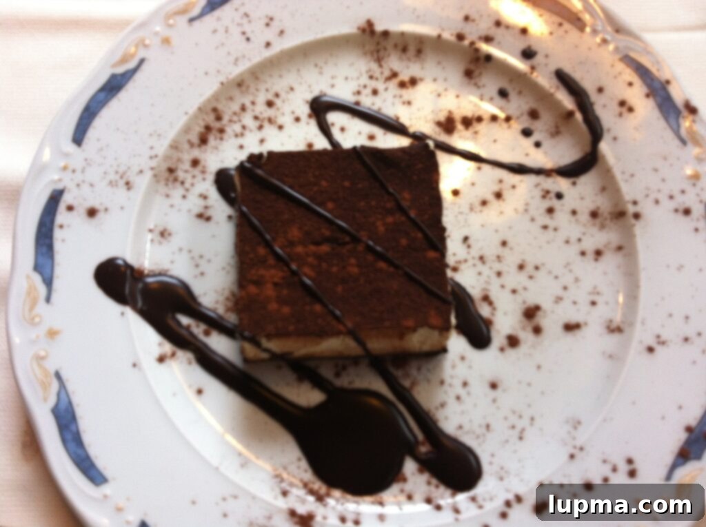 Cinque Terre and Santa Margherita Italy Coastal Charms 6 A delectable slice of tiramisu, rich with coffee and cream, a classic Italian dessert