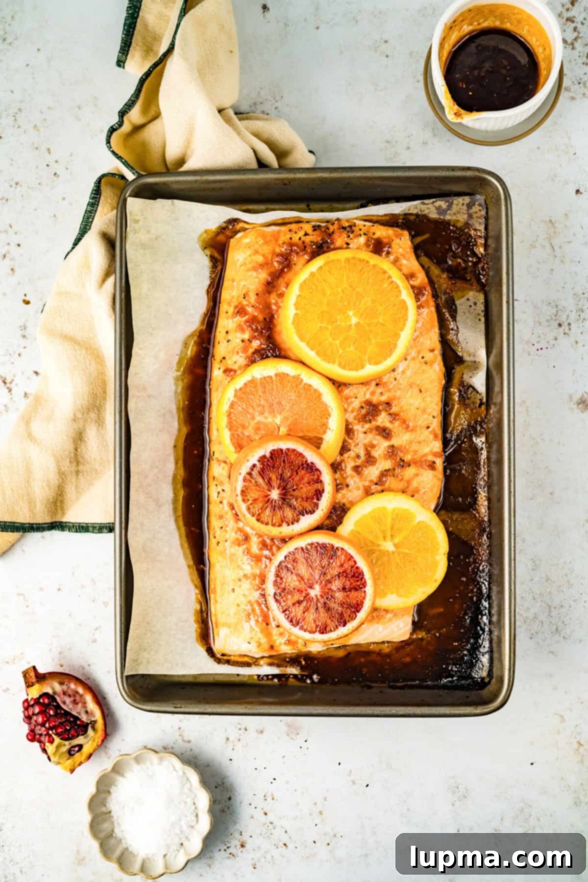 Orange Glazed Salmon cooked on baking sheet 