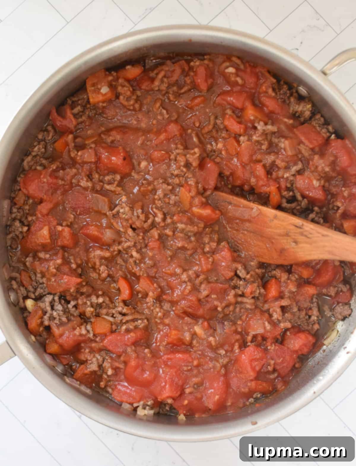 editerranean Beef and Cabbage Stir-fry with sauce in a skillet 