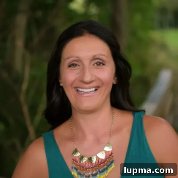 Julia, author of A Cedar Spoon, smiling.