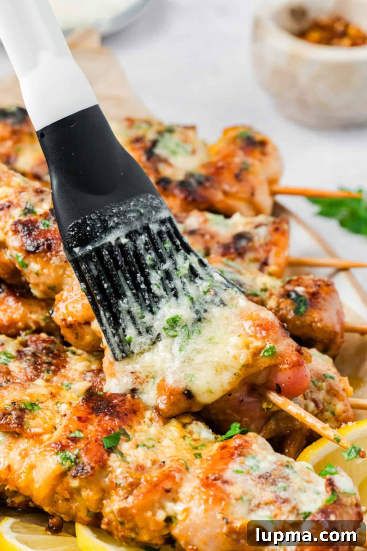 Garlic Parmesan Chicken Kebabs 11 Garlic Parmesan Chicken Skewers brushed with garlic butter parmesan sauce