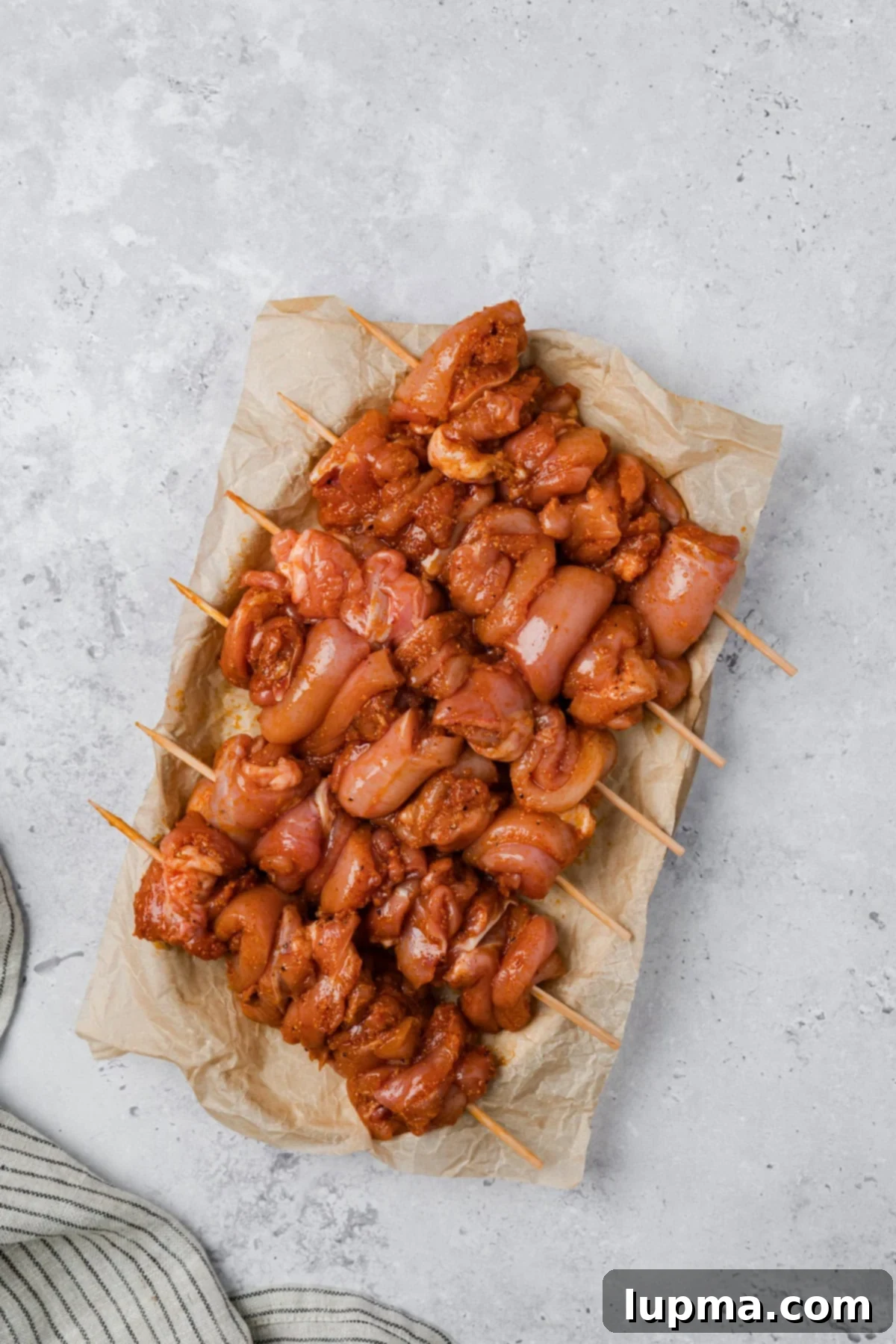 Garlic Parmesan Chicken Kebabs 9 Garlic Parmesan Chicken Skewers threaded onto skewers