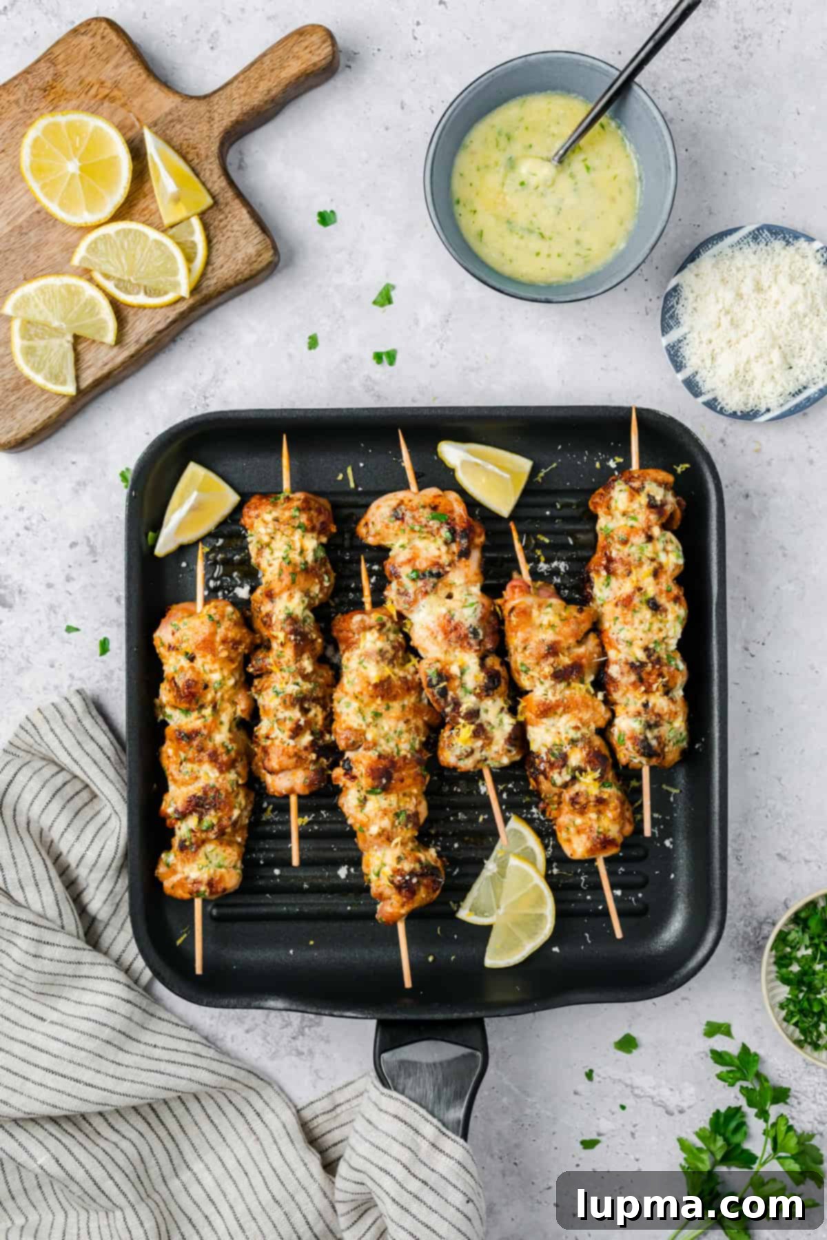 Garlic Parmesan Chicken Kebabs 10 Garlic Parmesan Chicken Skewers on grill pan