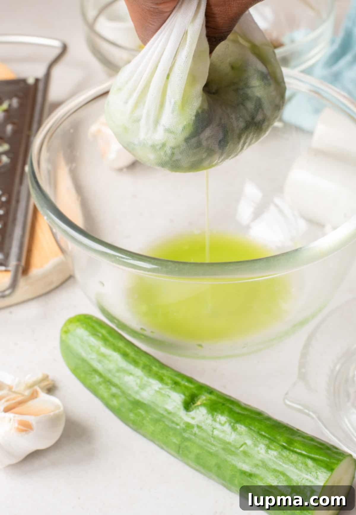 Greek Style Yogurt Dip draining cucumber