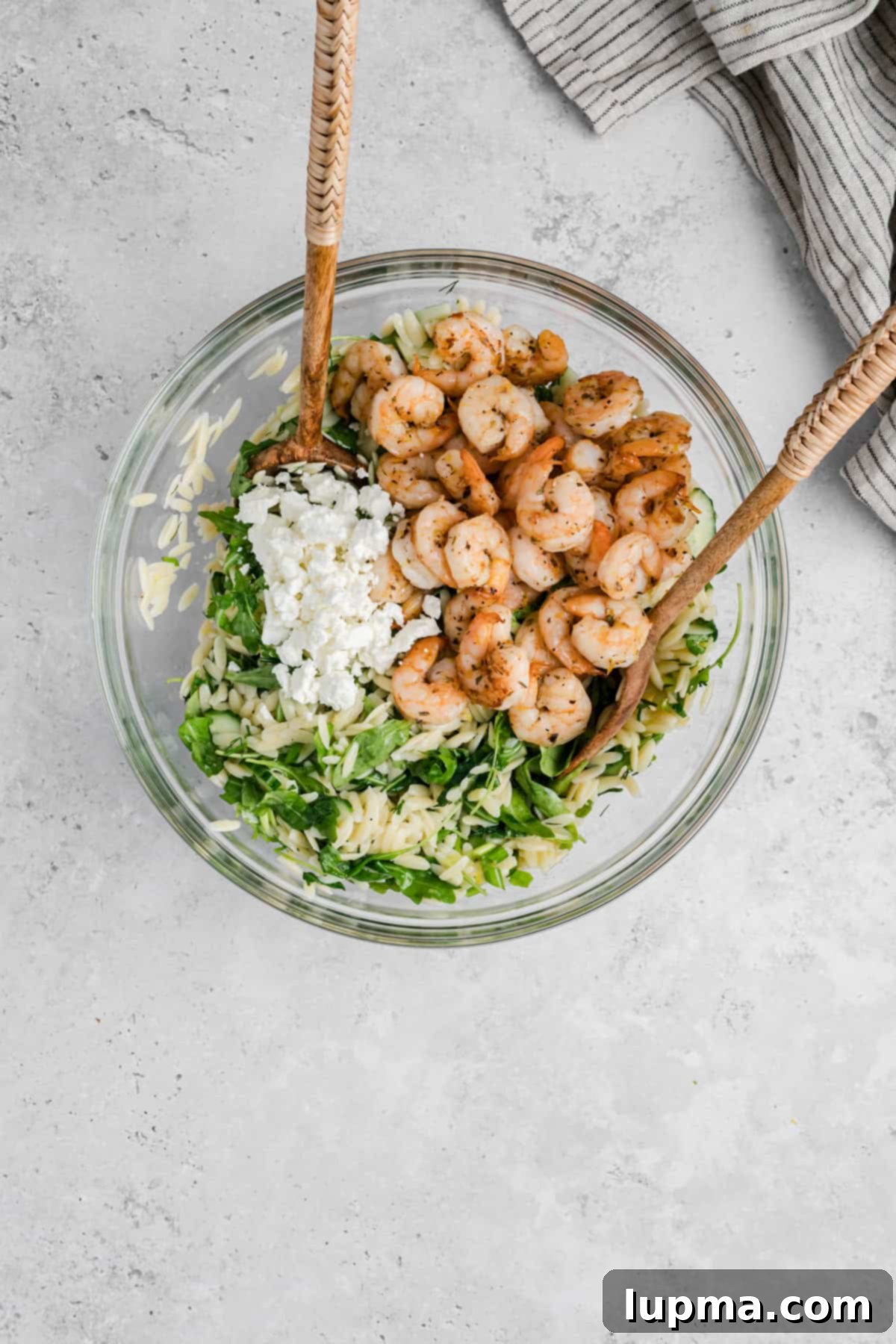Shrimp Orzo Salad with Lemon-Dill Dressing 11 Easy Shrimp and Orzo Salad ingredients in a clear bowl