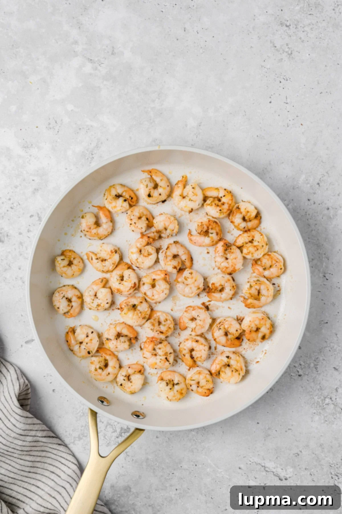 Shrimp Orzo Salad with Lemon-Dill Dressing 8 Shrimp Orzo Salad shrimp cooking in a skillet
