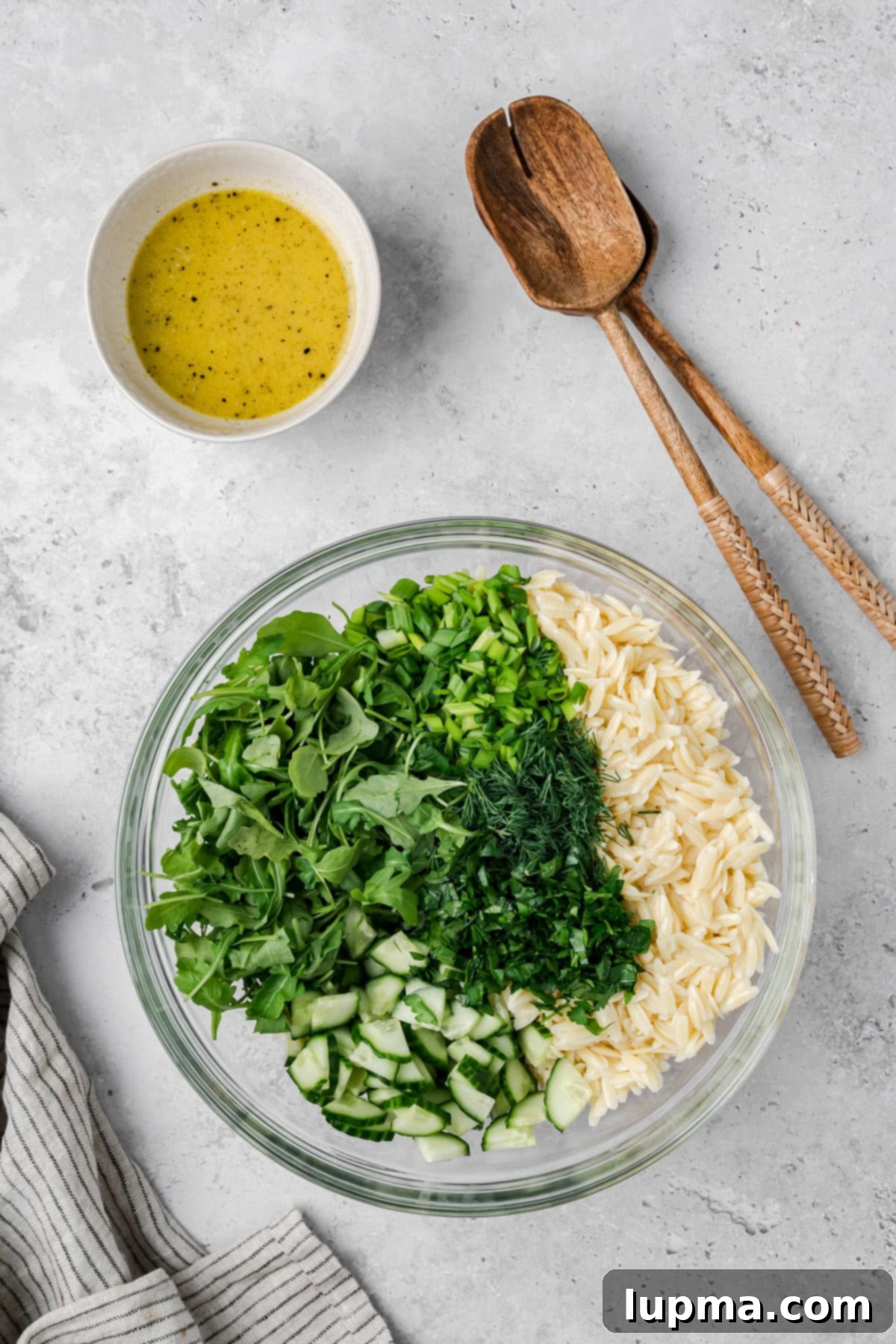 Shrimp Orzo Salad with Lemon-Dill Dressing 10 Shrimp Orzo and Pasta Salad in a clear bowl