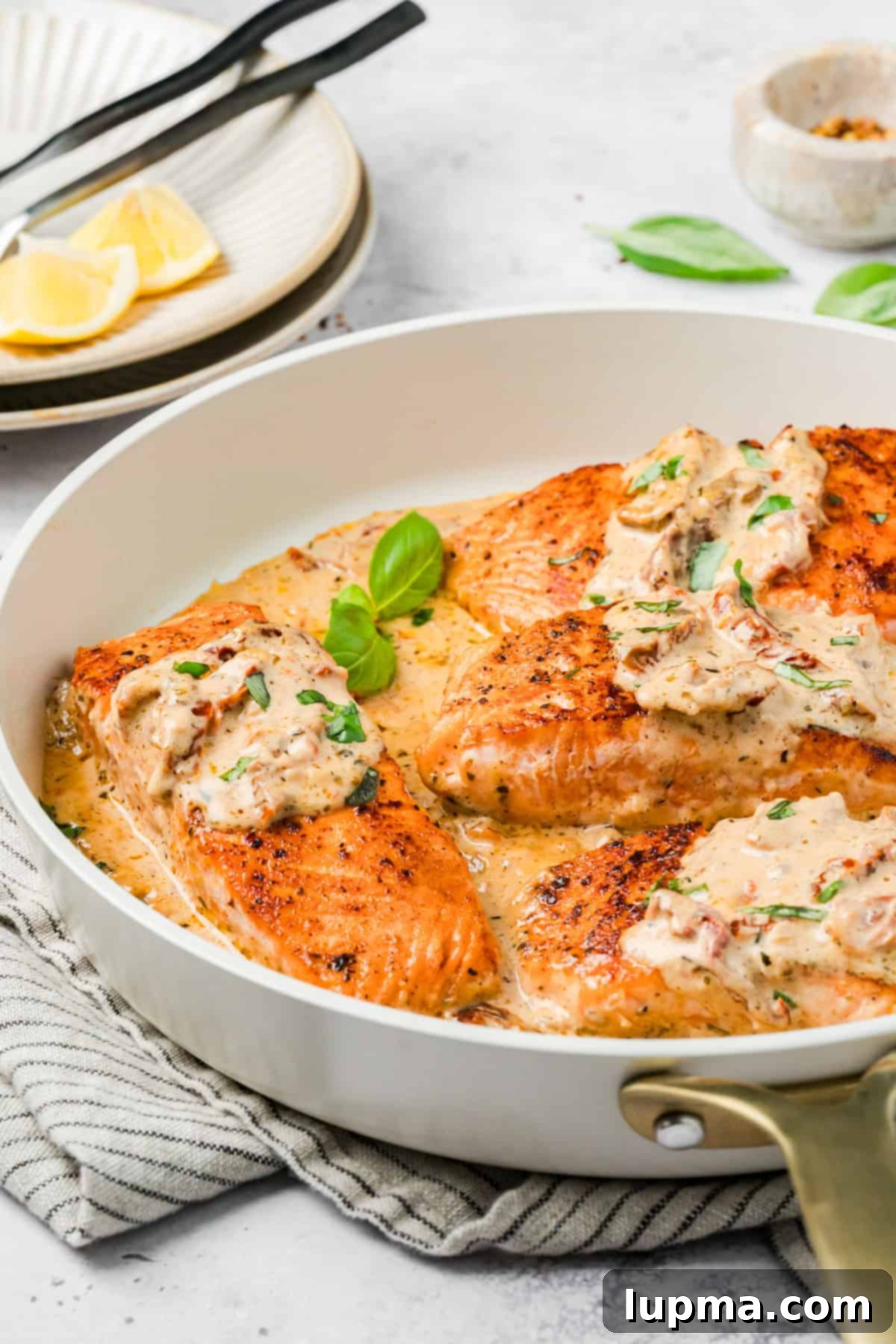 Marry Me Salmon
Forever Entwined Salmon 12 Easy Marry Me Salmon with fresh Basil in a skillet