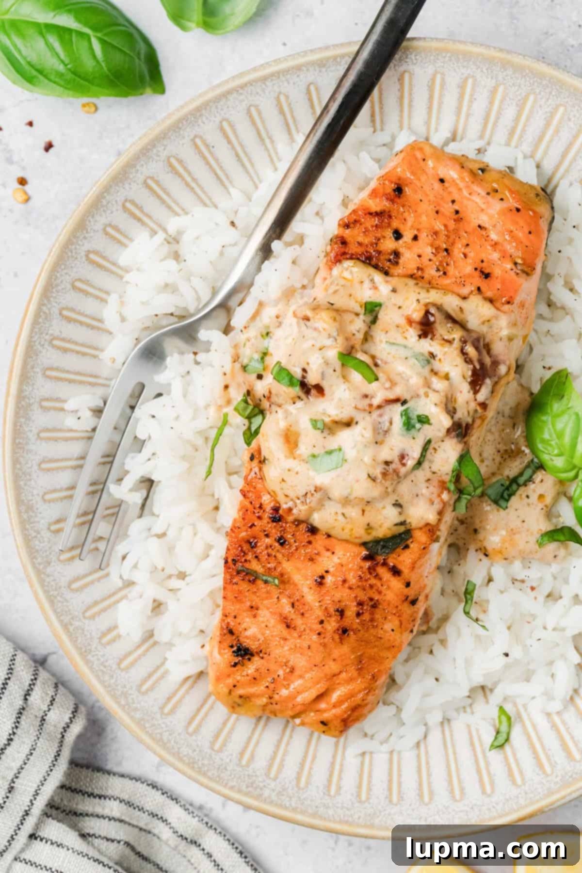 Marry Me Salmon
Forever Entwined Salmon 6 Marry Me Salmon Recipe on a plate with a fork
